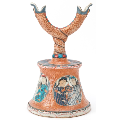 80 - Chinese Islamic pottery candlestick decorated in low relief and hand painted with roundels of figure... 