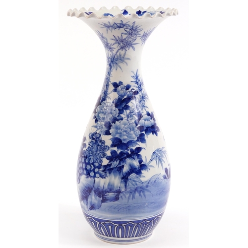 343 - Large Japanese blue and white porcelain vase with frilled rim hand painted with flowers, character m... 