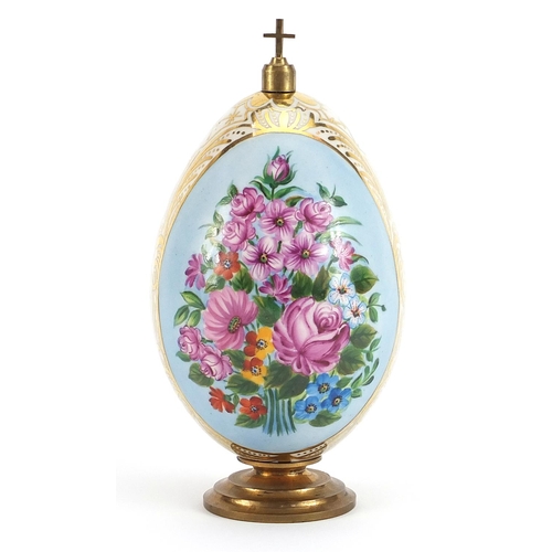 164 - Antique Russian porcelain Easter egg on metal stand with cross, the egg hand painted with panels of ... 