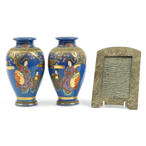 1021 - Pair of Japanese Satsuma pottery vases and an antimony photo frame embossed with flowers, the vases ... 