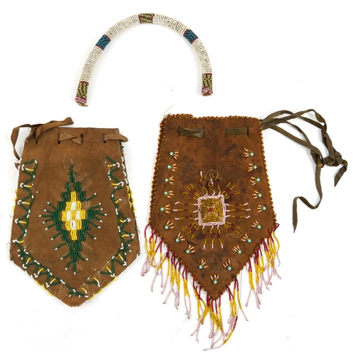 428 - Two African tribal interest leather satchels with beadwork decoration and a collar, the satchels eac... 