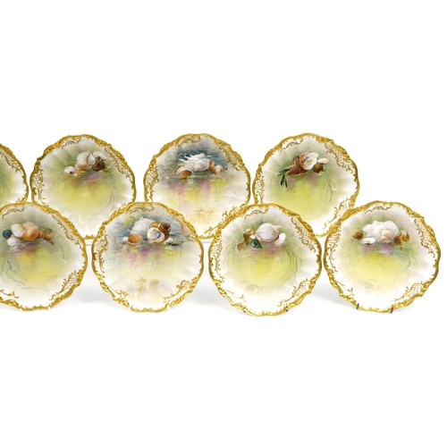 245 - Limoges, Ten French porcelain desert plates with gilt borders, each hand painted with shells and ind... 