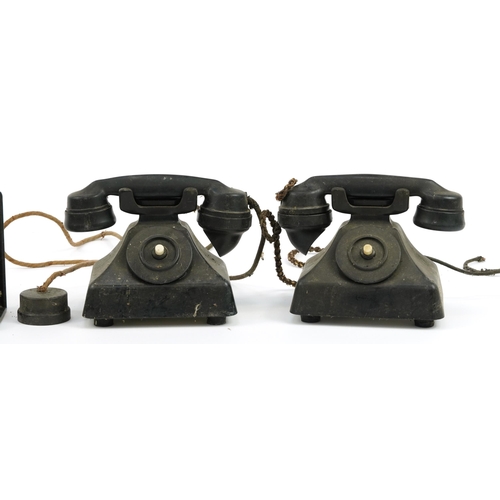 626 - Pair of vintage black Bakelite internal pyramid telephones and a shelf bracket, one printed Gent's o... 