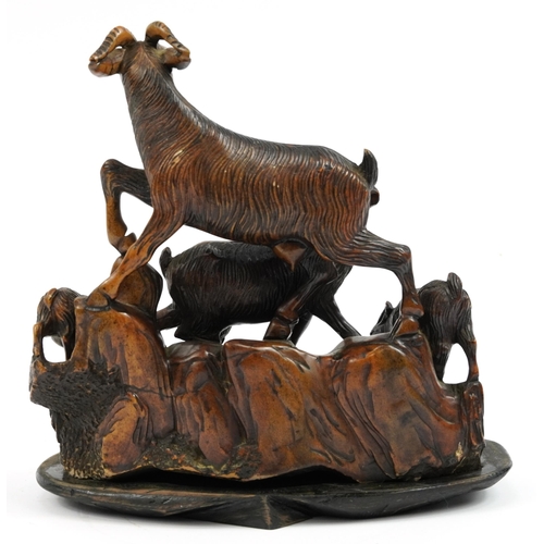 517 - Unusual Chinese soapstone carving on stand carved with five mountain goats, 23.5cm wide