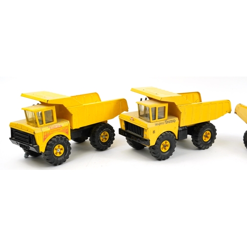 1578 - Four vintage tinplate construction vehicles comprising Tonka and Matchbox, the largest 48cm in lengt... 