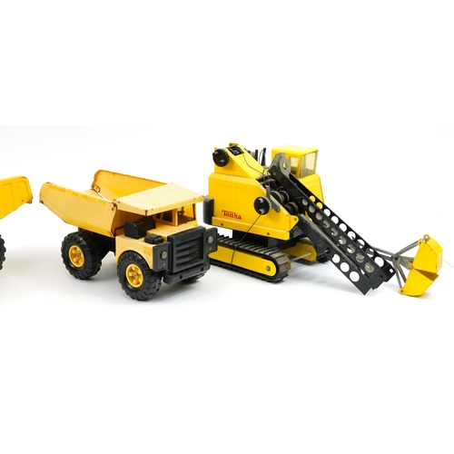 1578 - Four vintage tinplate construction vehicles comprising Tonka and Matchbox, the largest 48cm in lengt... 