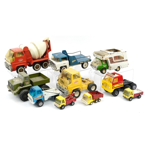 1563 - Vintage tinplate vehicles including Tonka and Meccano, the largest 35cm in length