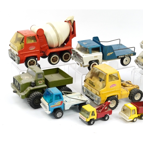 1563 - Vintage tinplate vehicles including Tonka and Meccano, the largest 35cm in length