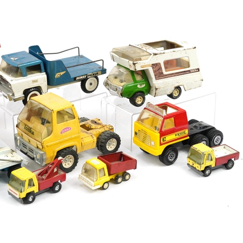 1563 - Vintage tinplate vehicles including Tonka and Meccano, the largest 35cm in length