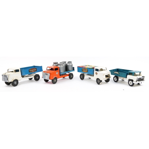 1558 - Four large vintage tinplate Tri-ang transport trucks, the largest 37cm in length