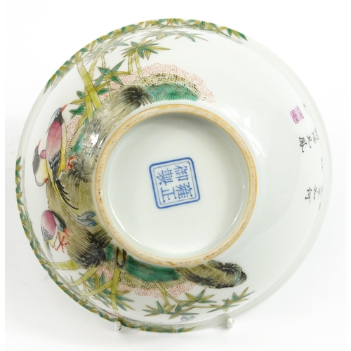 576 - Chinese porcelain bowl hand painted in the famille rose palette with birds amongst bamboo groves, ca... 