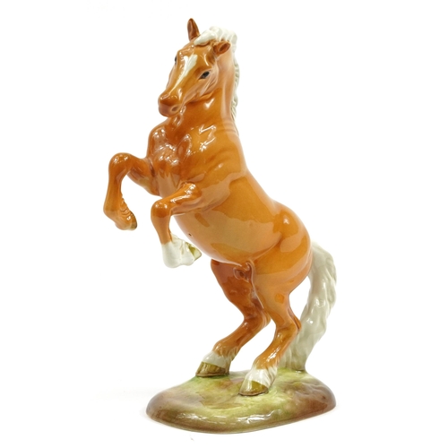 981 - Beswick Palomino rearing horse numbered 1014, 27cm high