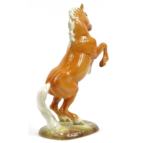 981 - Beswick Palomino rearing horse numbered 1014, 27cm high