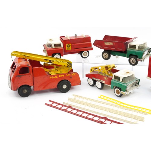 1569 - Five large vintage Tri-ang tinplate vehicles including transport truck and fire engine, the largest ... 