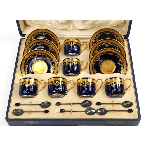 244 - Set of six Limoges blue ground gilt decorated coffee cups and saucers retailed by Mappin & Webb and ... 