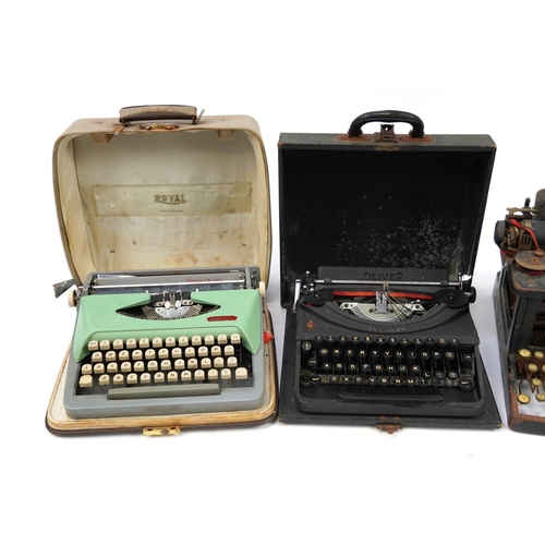 1183 - Three vintage typewriters and a Schubert Rastatt Exactus calculator comprising L C Smith & Bros, Oli... 