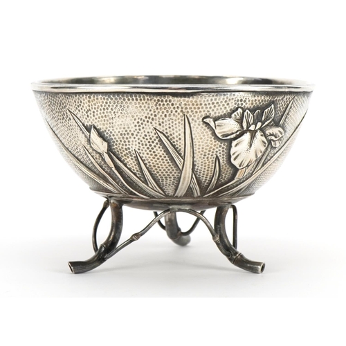 209 - Kuhn & Komor, Japanese sterling silver bowl raised on three naturalistic feet and embossed with flow... 