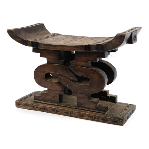 433 - Large tribal interest carved hardwood headrest design stool, 39.5cm H x 56cm W x 20.5cm D