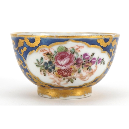 508 - Chinese porcelain blue ground tea bowl hand painted in the famille rose palette with flowers, 7.5cm ... 