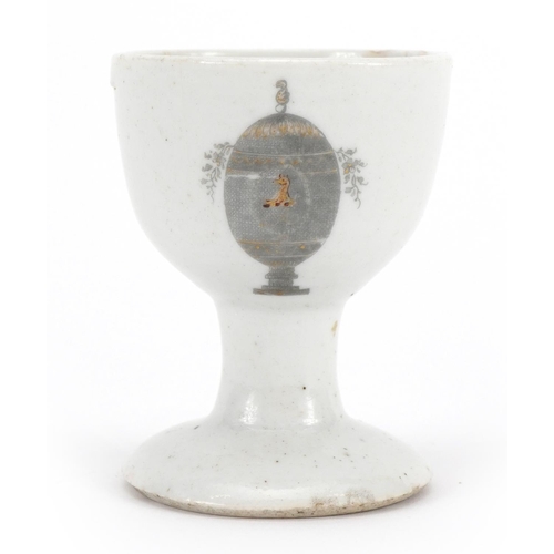 200 - Chinese porcelain eggcup hand painted and gilded with an armorial crest, Guest & Grey label to the b... 