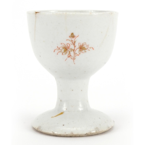 200 - Chinese porcelain eggcup hand painted and gilded with an armorial crest, Guest & Grey label to the b... 