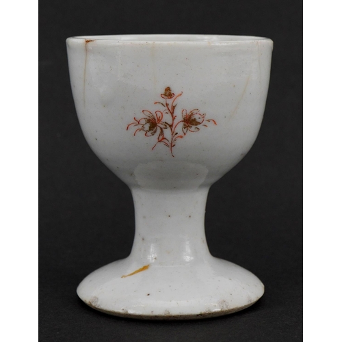 200 - Chinese porcelain eggcup hand painted and gilded with an armorial crest, Guest & Grey label to the b... 