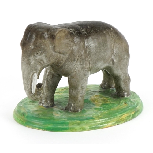 173 - 19th century pearlware model of an elephant, 21cm in length