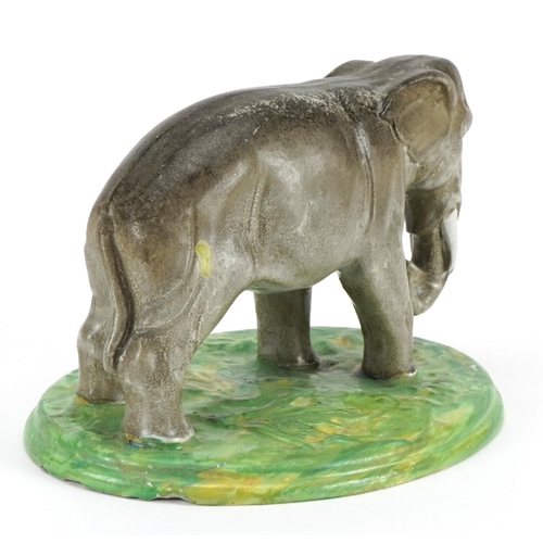 173 - 19th century pearlware model of an elephant, 21cm in length