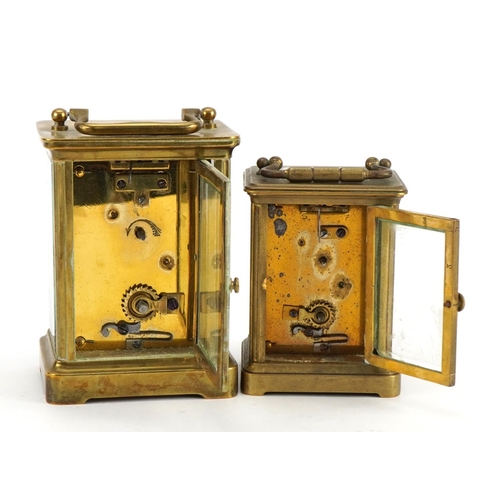 612 - Two brass cased carriage clocks with enamelled dials and Roman numerals, the largest 11cm high