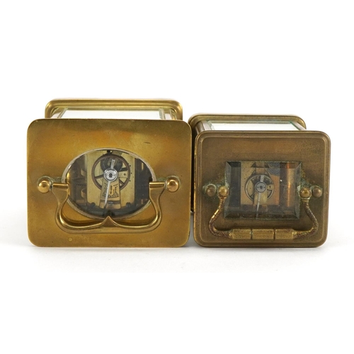 612 - Two brass cased carriage clocks with enamelled dials and Roman numerals, the largest 11cm high