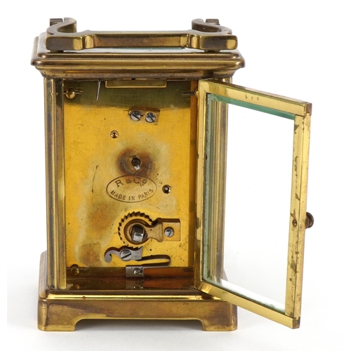 611 - Richard & Co, brass cased carriage clock with enamelled dial having Roman numerals, 11cm high