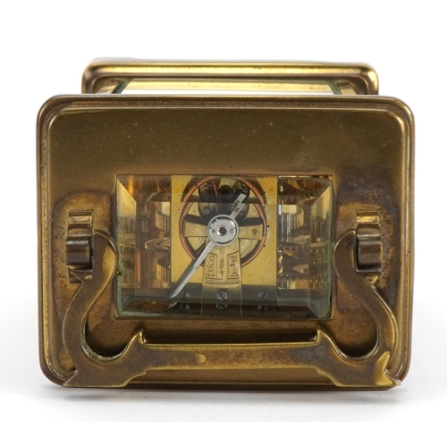 611 - Richard & Co, brass cased carriage clock with enamelled dial having Roman numerals, 11cm high