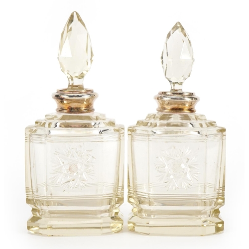 1048 - Pair of etched cut glass scent bottles with silver collars, each 15cm high