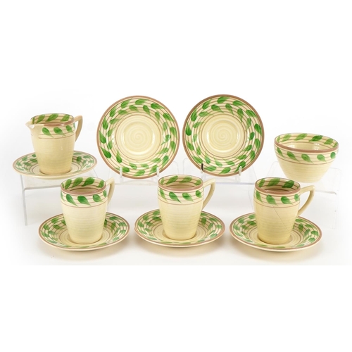 124 - Clarice Cliff, Art Deco Bizarre teaware comprising three cups, six saucers, milk jug and sugar bowl,... 