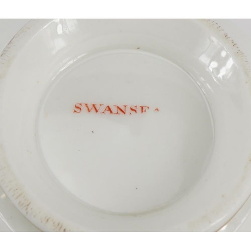 96 - Early 19th century Swansea porcelain cup and saucer, the cup 6cm high