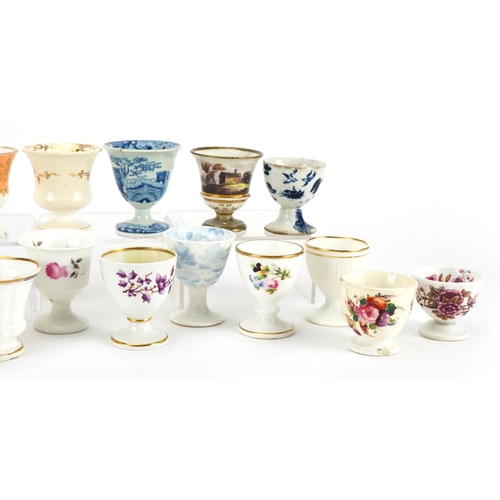 241 - Collection of seventeen early 19th century and later eggcups including Flight Barr & Barr and one ha... 