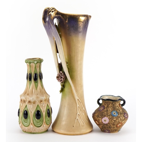 374 - Amphora, Art Nouveau Czechoslovakian pottery including a large floral encrusted jug and one enamelle... 