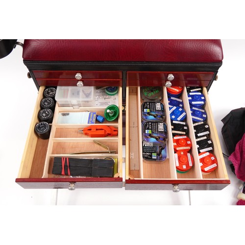 669 - Boss fishing tackle box with a selection of fishing tackle including floats, hooks and lines