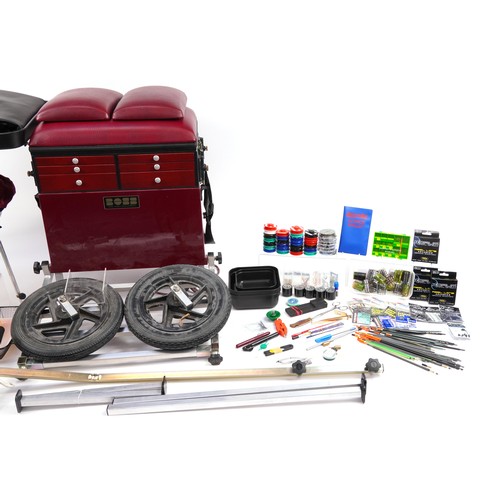 669 - Boss fishing tackle box with a selection of fishing tackle including floats, hooks and lines