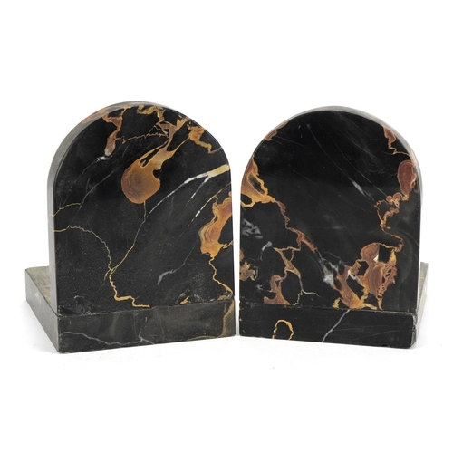 647 - Pair of Art Deco black and white marble bookends, 13cm high