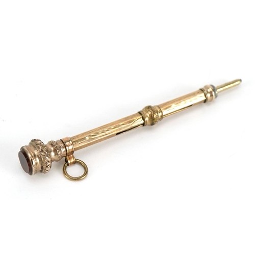 630 - Antique yellow metal chatelaine propelling pencil set with a citrine, 5.5cm in length, 2.6g