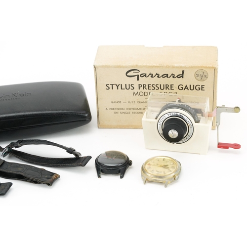 719 - Sundry items including Garrard stylus pressure gauge model SPG3 and two wristwatches