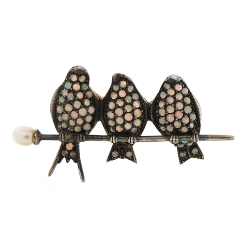 Unmarked gold three birds on a branch brooch set with cabochon opals, diamonds and a freshwater pearl, 4.5cm wide, 6.4g