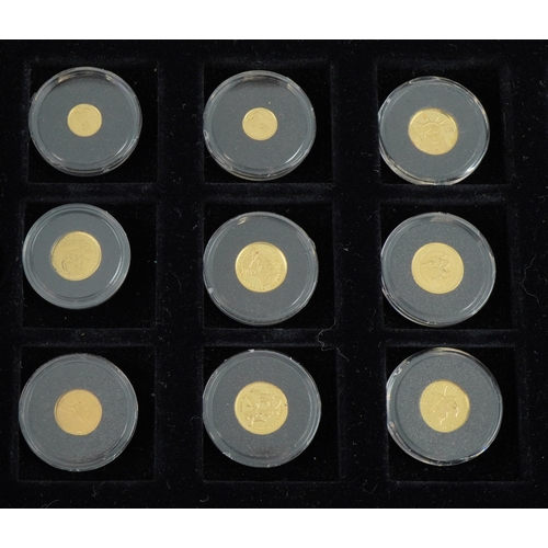 2536 - The Smallest Gold Coins of the World Collection comprising twelve coins arranged in a fitted case