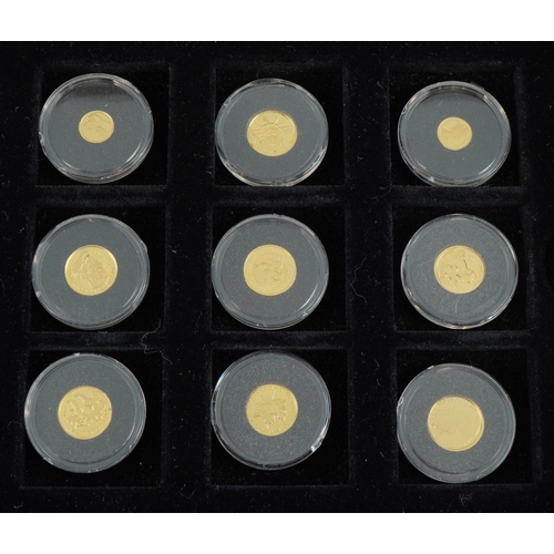 2536 - The Smallest Gold Coins of the World Collection comprising twelve coins arranged in a fitted case