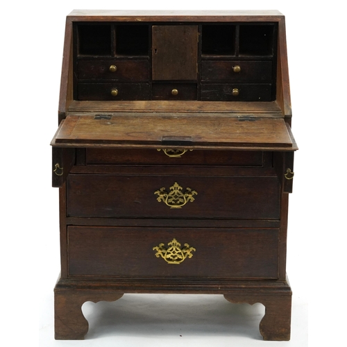 876 - George III oak child's bureau with fitted interior and brass handles, 87cm H x 62cm W x 44cm D