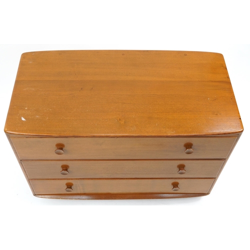 857 - Ercol light elm three drawer chest, 66cm H x 91cm W x 48cm D