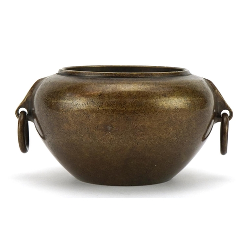 965 - Chinese patinated bronze censer with ring turned handles, five figure character marks to the base, 7... 