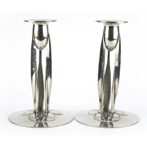 189 - Archibald Knox for Liberty & Co, pair of Arts & Crafts English pewter candlesticks, impressed 0223 t... 