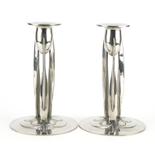 189 - Archibald Knox for Liberty & Co, pair of Arts & Crafts English pewter candlesticks, impressed 0223 t... 